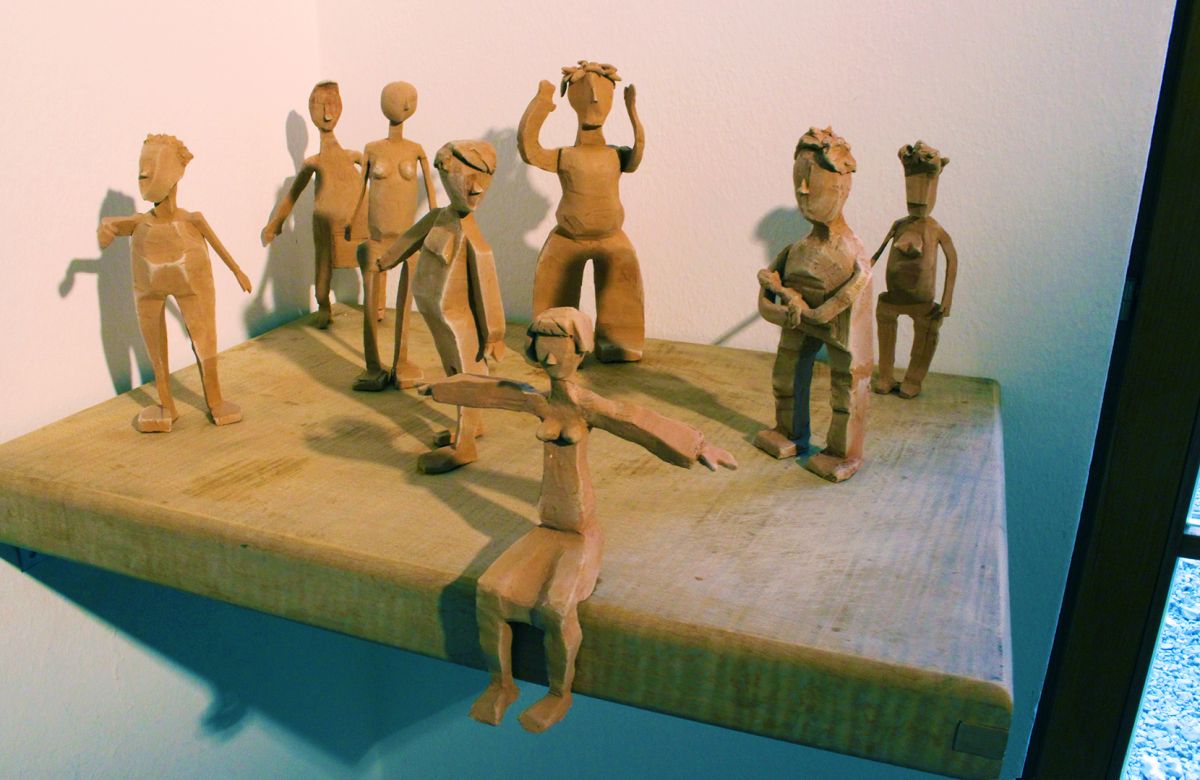Sketches of characters in clay.