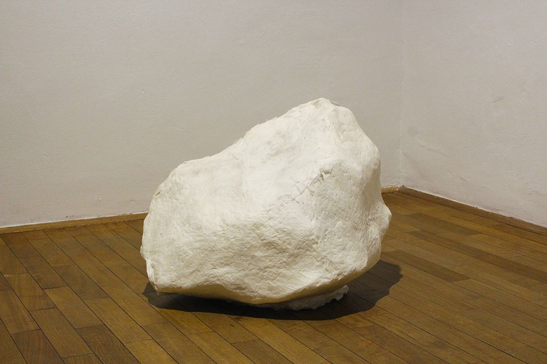 Paper cast of the rock with moss by Katja Oblak, front.