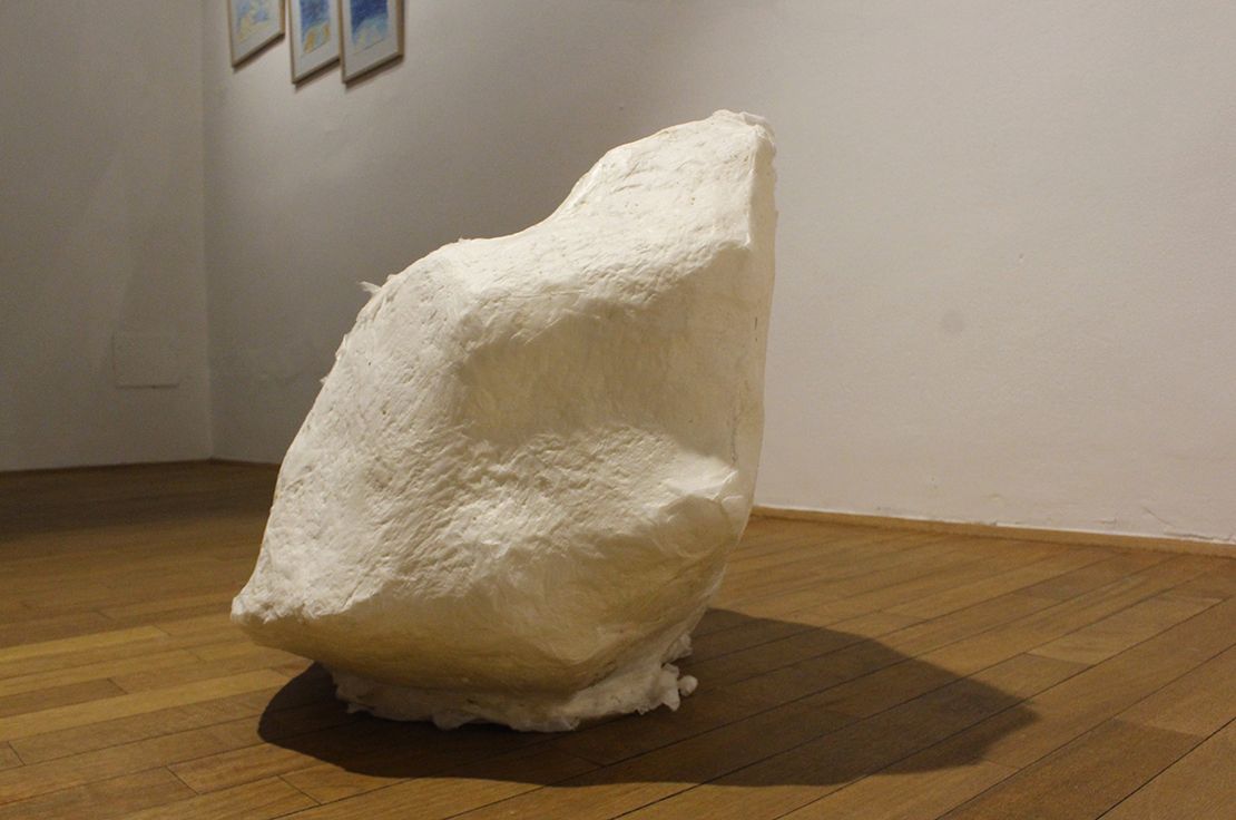 Paper cast of the rock with moss by Katja Oblak, from the side.