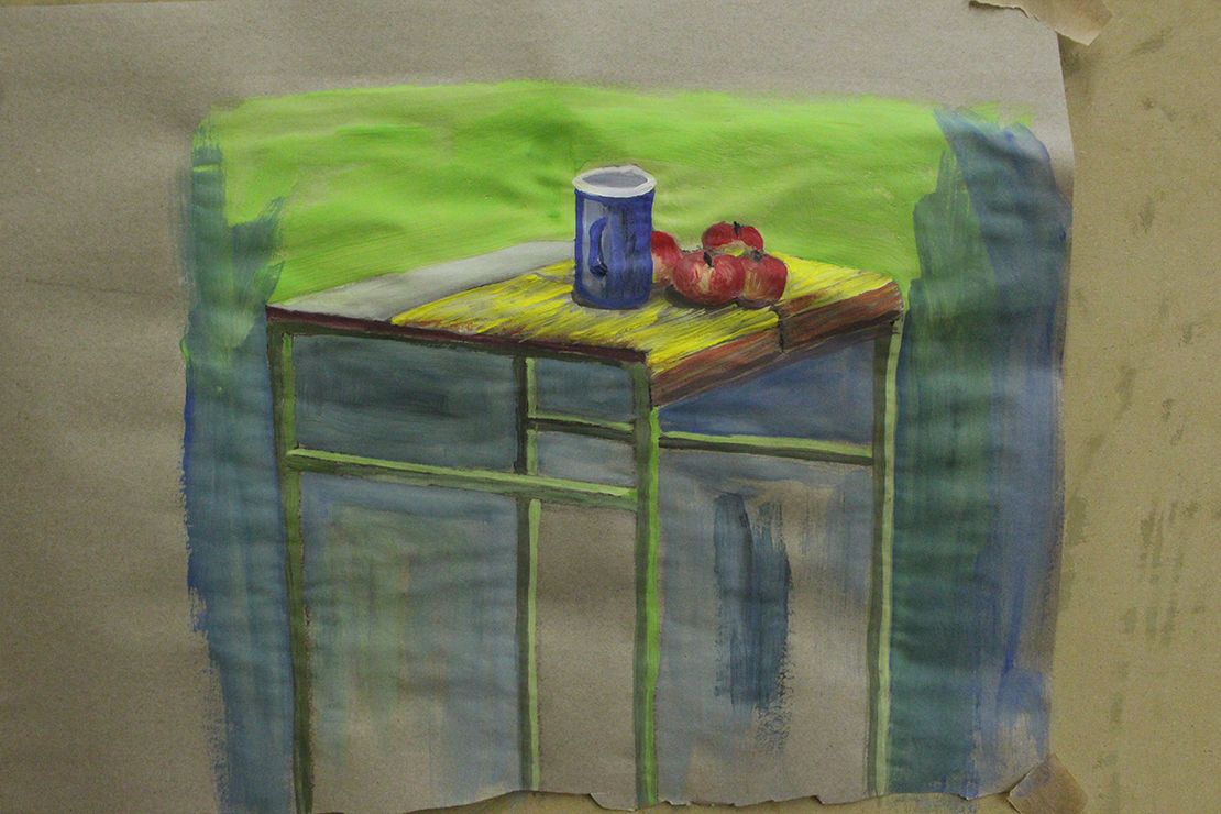Painting still life with apples in cromatic colors.