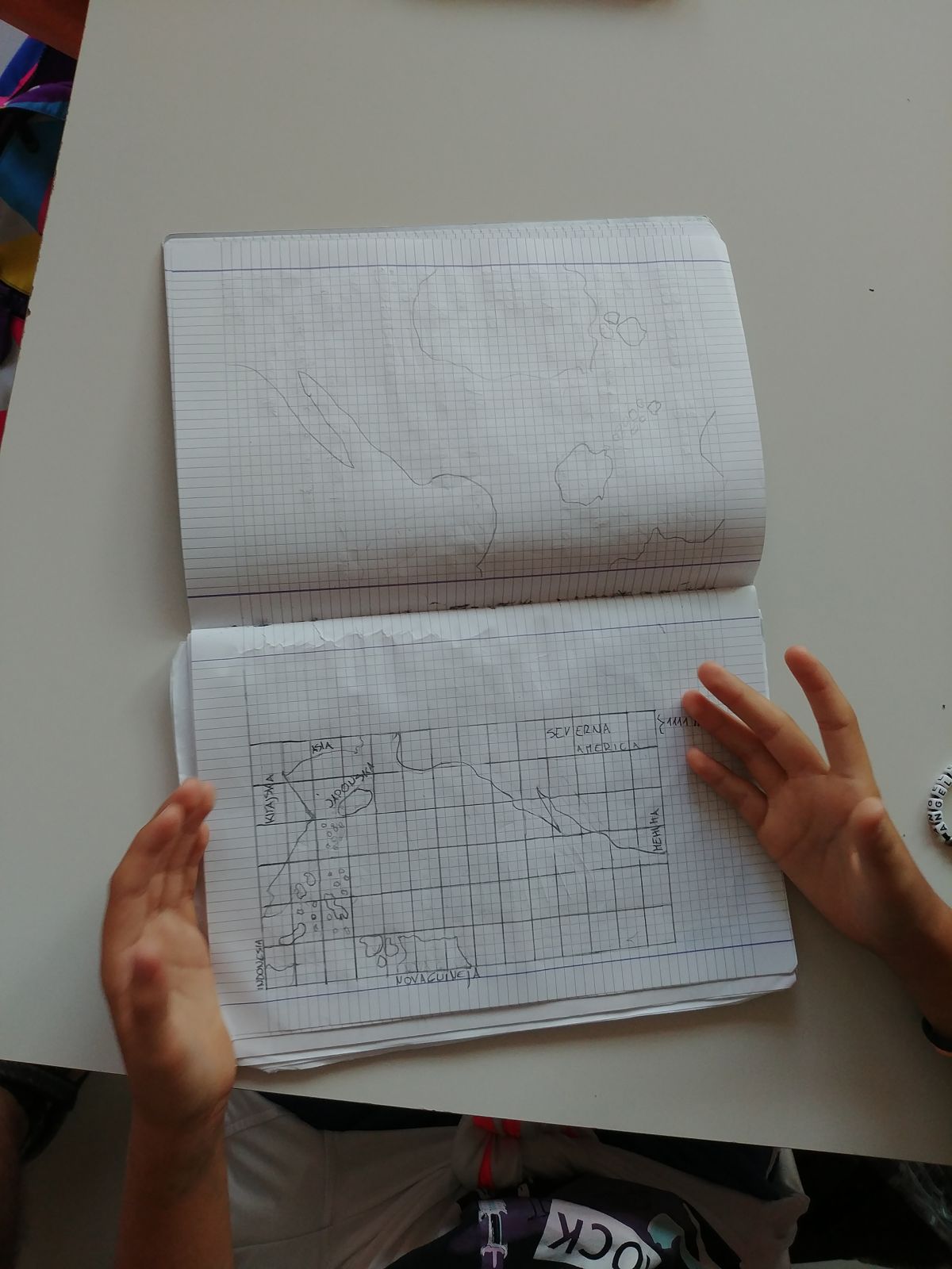 Drawing the map of the Pacific - freehand and into the rectangular grid.